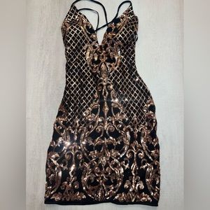 Party dress. Gold and black. Small.